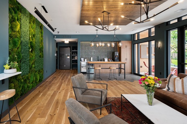 Greenery wall in common space at Westside Flats